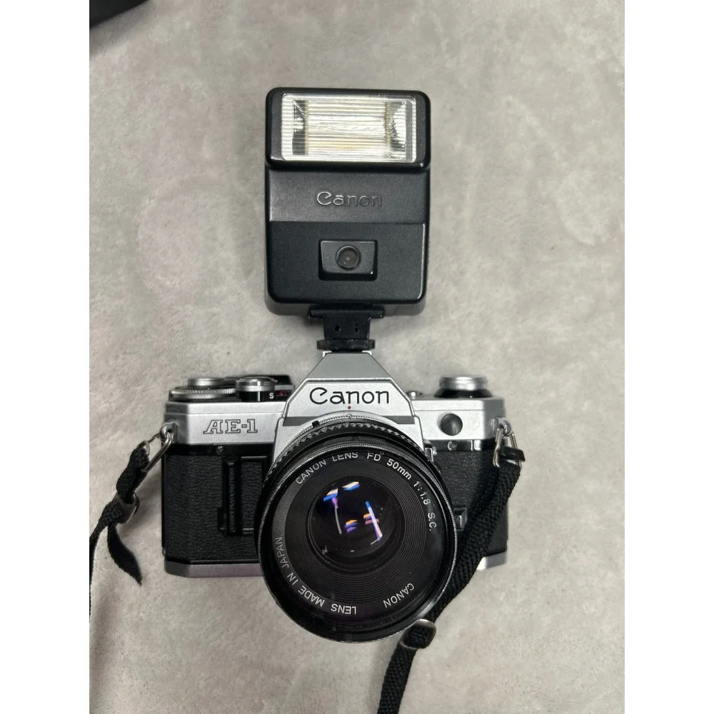 Canon AE-1 Film Camera SLR 35mm 50mm Lens Flash Case Manual Film Lot Untested